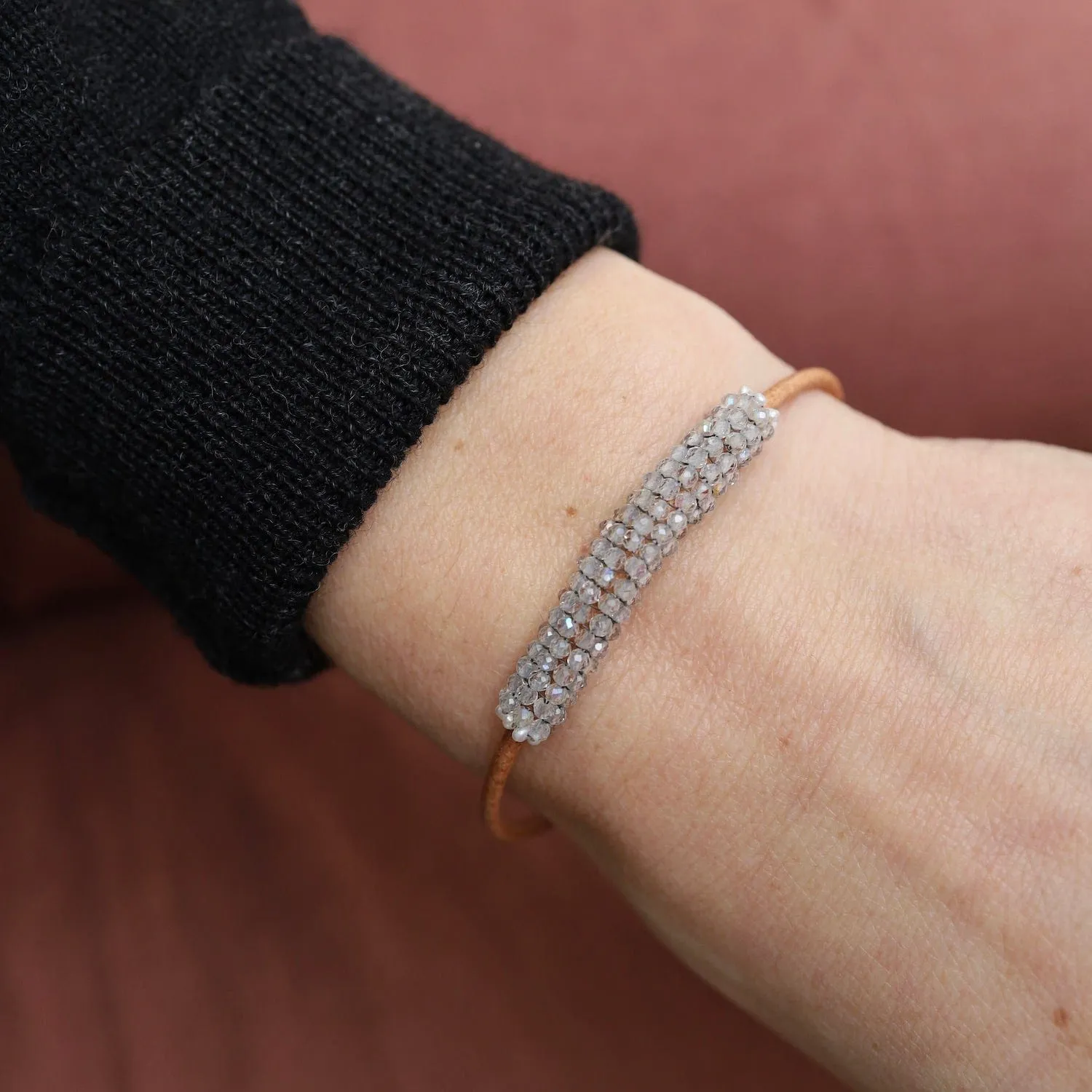 Hand Stitched Sparkly Topaz with Tiny White Pearl Trim on Natural Leather Bracelet