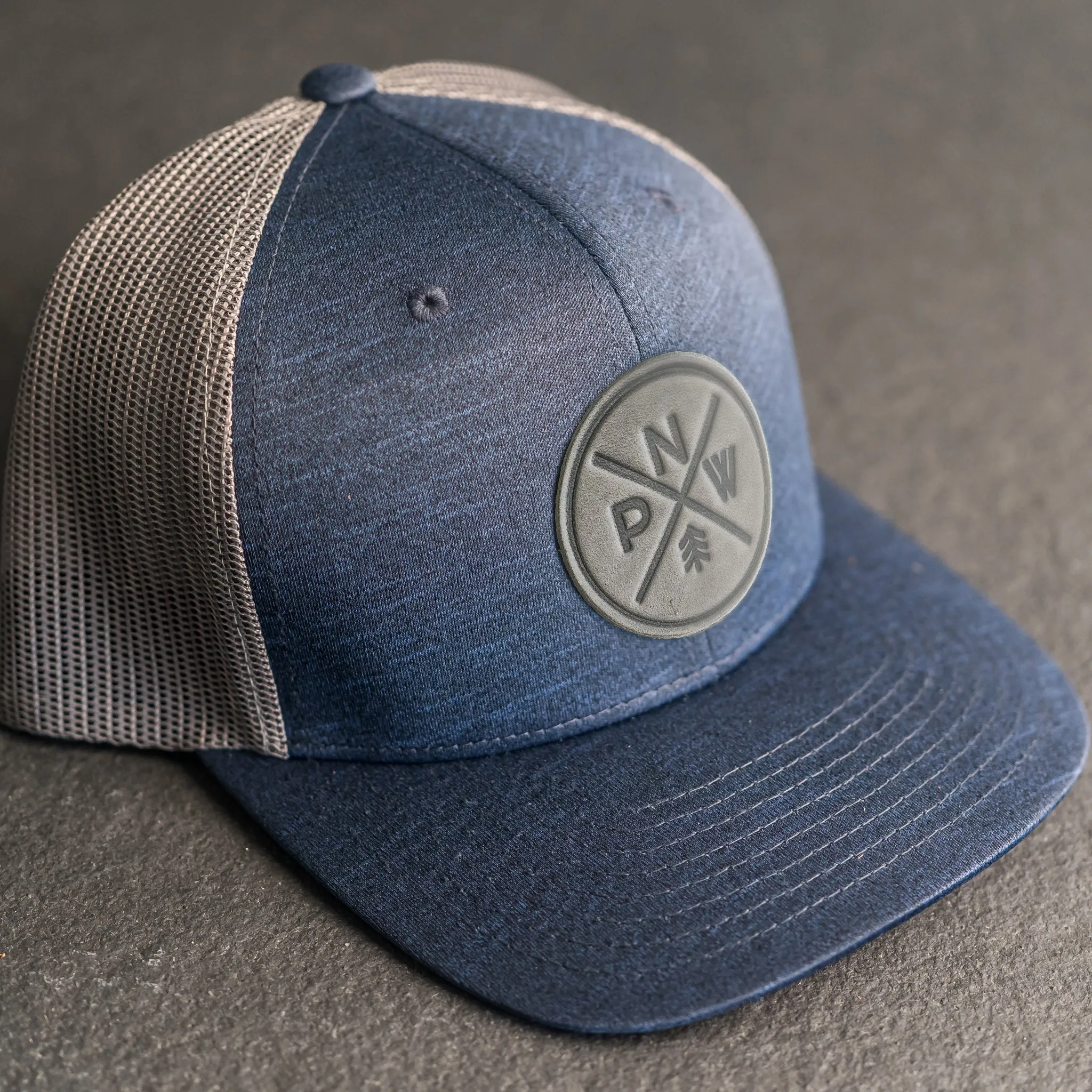 Leather Patch Performance Style Trucker Hat - PNW Stamp