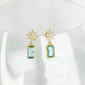 Ninaouity Gold Pole Star and Blue Square Crystal Earrings